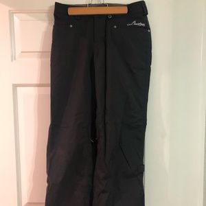 Black Burton snow pants.